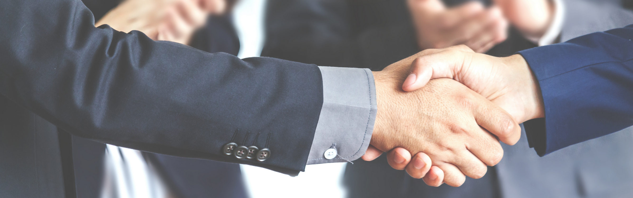 acquire.jpg (Handshake of business partners)